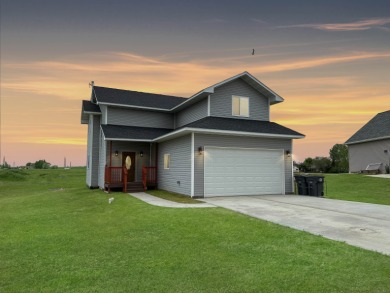 Less time commuting, more time to enjoy home! The warm welcome on Stanley Country Club in North Dakota - for sale on GolfHomes.com, golf home, golf lot