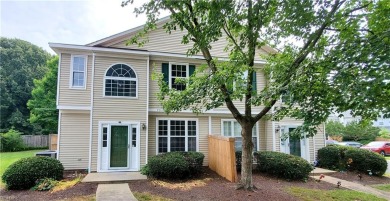 Two-bedroom end unit townhome with OFFICE, all new flooring on Kiln Creek Golf and Country Club in Virginia - for sale on GolfHomes.com, golf home, golf lot