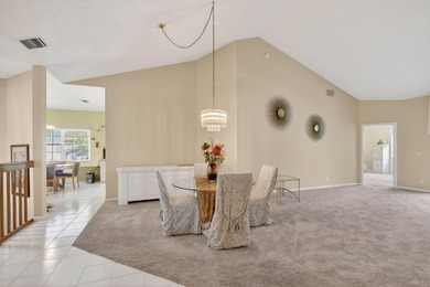 Lovely 2 bedroom, 2 bath residence with soaring vaulted ceilings on Indian Spring Golf and Country Club in Florida - for sale on GolfHomes.com, golf home, golf lot