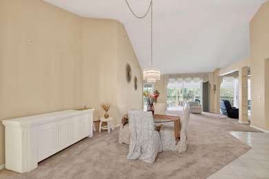 Lovely 2 bedroom, 2 bath residence with soaring vaulted ceilings on Indian Spring Golf and Country Club in Florida - for sale on GolfHomes.com, golf home, golf lot