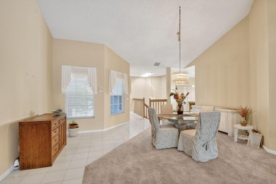 Lovely 2 bedroom, 2 bath residence with soaring vaulted ceilings on Indian Spring Golf and Country Club in Florida - for sale on GolfHomes.com, golf home, golf lot