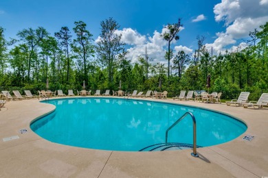 Vaulted ceilings in the great room and plenty of sunlight make on International Club of Myrtle Beach in South Carolina - for sale on GolfHomes.com, golf home, golf lot