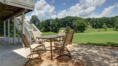 Stately executive home located on the 16th Fairway of the on Woodmont Golf and Country Club in Georgia - for sale on GolfHomes.com, golf home, golf lot