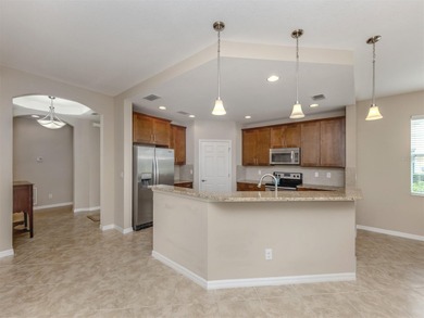 LAKEFRONT WCI BUILT CARRIAGE HOME WITH THREE-BEDROOMS - LAKE on Venetian Golf and River Club in Florida - for sale on GolfHomes.com, golf home, golf lot