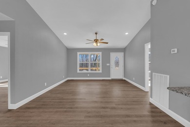 Experience modern comfort and a true lakeside lifestyle in this on Lake Tansi Village Country Club in Tennessee - for sale on GolfHomes.com, golf home, golf lot