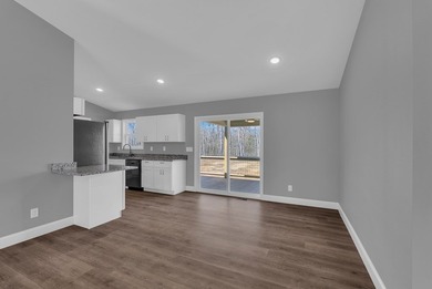 Experience modern comfort and a true lakeside lifestyle in this on Lake Tansi Village Country Club in Tennessee - for sale on GolfHomes.com, golf home, golf lot