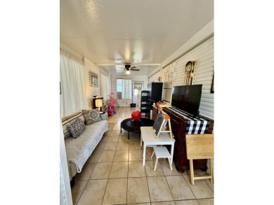 Opportunity knocks with this charming furnished and turnkey on Cypress Creek Country Club - Boynton Beach in Florida - for sale on GolfHomes.com, golf home, golf lot