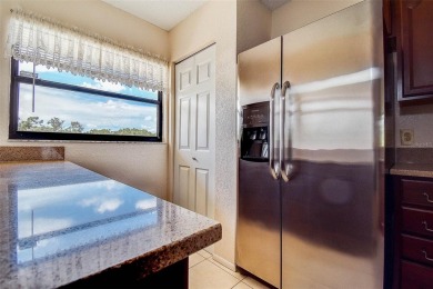 Step into a bright, easy-living 2-bedroom, 2-bath condominium on Cove Cay Country Club in Florida - for sale on GolfHomes.com, golf home, golf lot