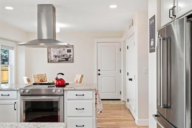 Situated on a quiet cul-de-sac in sought after Golden Meadows on Collindale Golf Course in Colorado - for sale on GolfHomes.com, golf home, golf lot