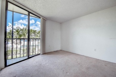 Step into a bright, easy-living 2-bedroom, 2-bath condominium on Cove Cay Country Club in Florida - for sale on GolfHomes.com, golf home, golf lot