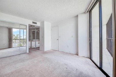 Step into a bright, easy-living 2-bedroom, 2-bath condominium on Cove Cay Country Club in Florida - for sale on GolfHomes.com, golf home, golf lot