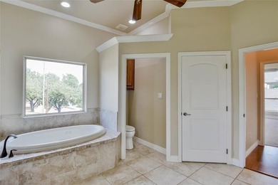 Welcome to this stunning custom-built 3-bedroom, 4-bathroom home on De Cordova Bend Country Club in Texas - for sale on GolfHomes.com, golf home, golf lot