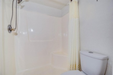 Step into a bright, easy-living 2-bedroom, 2-bath condominium on Cove Cay Country Club in Florida - for sale on GolfHomes.com, golf home, golf lot