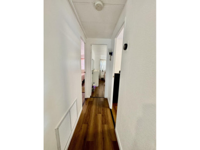 Opportunity knocks with this charming furnished and turnkey on Cypress Creek Country Club - Boynton Beach in Florida - for sale on GolfHomes.com, golf home, golf lot