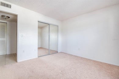 Step into a bright, easy-living 2-bedroom, 2-bath condominium on Cove Cay Country Club in Florida - for sale on GolfHomes.com, golf home, golf lot