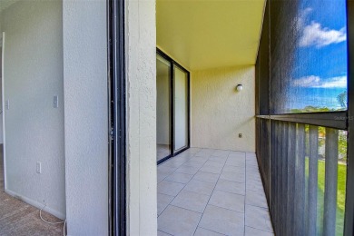 Step into a bright, easy-living 2-bedroom, 2-bath condominium on Cove Cay Country Club in Florida - for sale on GolfHomes.com, golf home, golf lot
