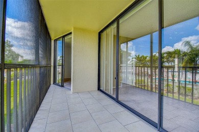 Step into a bright, easy-living 2-bedroom, 2-bath condominium on Cove Cay Country Club in Florida - for sale on GolfHomes.com, golf home, golf lot
