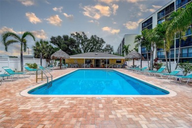 Step into a bright, easy-living 2-bedroom, 2-bath condominium on Cove Cay Country Club in Florida - for sale on GolfHomes.com, golf home, golf lot