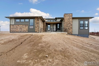 New home by Trumark on a beautiful one-acre homesite! Voluminous on Raindance National Golf Course in Colorado - for sale on GolfHomes.com, golf home, golf lot