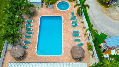 Step into a bright, easy-living 2-bedroom, 2-bath condominium on Cove Cay Country Club in Florida - for sale on GolfHomes.com, golf home, golf lot
