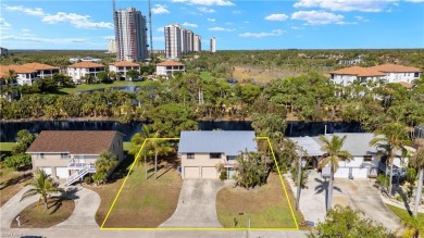 Discover this delightful Olde Florida-style, two-story home on The Colony Golf and Country Club in Florida - for sale on GolfHomes.com, golf home, golf lot