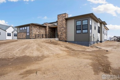 New home by Trumark on a beautiful one-acre homesite! Voluminous on Raindance National Golf Course in Colorado - for sale on GolfHomes.com, golf home, golf lot