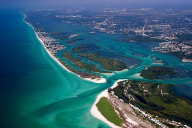 Live the relaxed Florida lifestyle you've been dreaming of in on Oyster Creek Golf Club in Florida - for sale on GolfHomes.com, golf home, golf lot