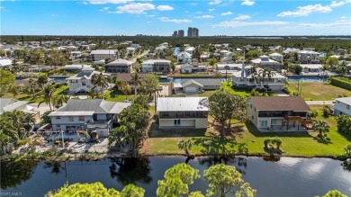 Discover this delightful Olde Florida-style, two-story home on The Colony Golf and Country Club in Florida - for sale on GolfHomes.com, golf home, golf lot