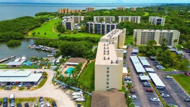 Step into a bright, easy-living 2-bedroom, 2-bath condominium on Cove Cay Country Club in Florida - for sale on GolfHomes.com, golf home, golf lot