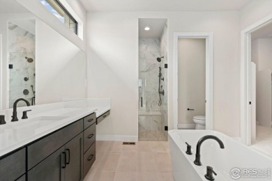 New home by Trumark on a beautiful one-acre homesite! Voluminous on Raindance National Golf Course in Colorado - for sale on GolfHomes.com, golf home, golf lot