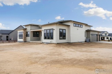 New home by Trumark on a beautiful one-acre homesite! Voluminous on Raindance National Golf Course in Colorado - for sale on GolfHomes.com, golf home, golf lot