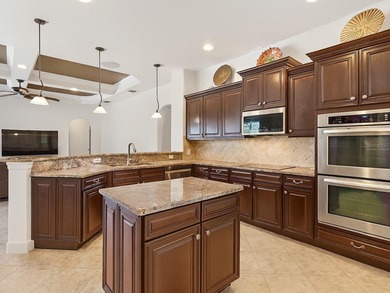 One or more photo(s) has been virtually staged. Positioned on a on Riverwood Golf Club in Florida - for sale on GolfHomes.com, golf home, golf lot