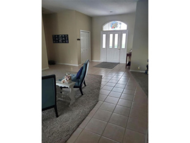 Selling our Florida home... 2,865 sq ft 4 bed / 3 bath / 3 car on Imperial Lakes Country Club in Florida - for sale on GolfHomes.com, golf home, golf lot