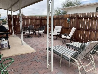 Very nice updated and furnished home with laminate flooring on Tucson Estates Golf Course in Arizona - for sale on GolfHomes.com, golf home, golf lot
