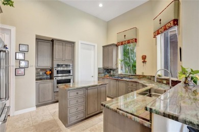 Welcome to this beautifully appointed home that blends elegance on Boca Grove Golf and Tennis in Florida - for sale on GolfHomes.com, golf home, golf lot