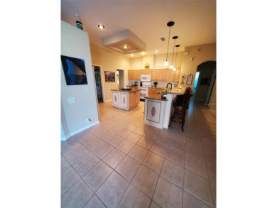 Selling our Florida home... 2,865 sq ft 4 bed / 3 bath / 3 car on Imperial Lakes Country Club in Florida - for sale on GolfHomes.com, golf home, golf lot
