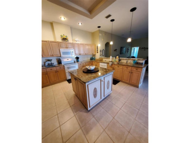 Selling our Florida home... 2,865 sq ft 4 bed / 3 bath / 3 car on Imperial Lakes Country Club in Florida - for sale on GolfHomes.com, golf home, golf lot