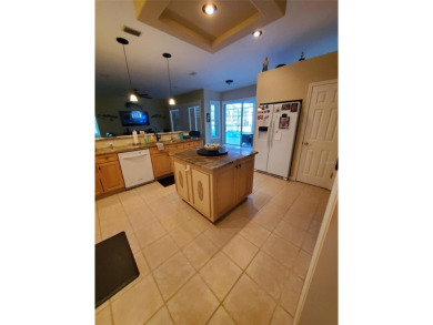 Selling our Florida home... 2,865 sq ft 4 bed / 3 bath / 3 car on Imperial Lakes Country Club in Florida - for sale on GolfHomes.com, golf home, golf lot