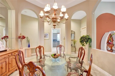 Welcome to this beautifully appointed home that blends elegance on Boca Grove Golf and Tennis in Florida - for sale on GolfHomes.com, golf home, golf lot