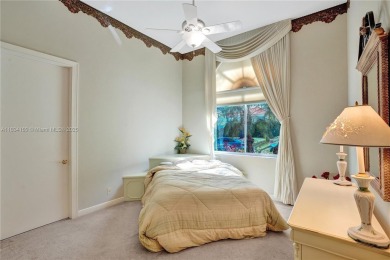Welcome to this beautifully appointed home that blends elegance on Boca Grove Golf and Tennis in Florida - for sale on GolfHomes.com, golf home, golf lot