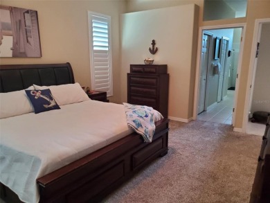 Selling our Florida home... 2,865 sq ft 4 bed / 3 bath / 3 car on Imperial Lakes Country Club in Florida - for sale on GolfHomes.com, golf home, golf lot