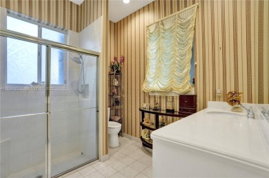 Welcome to this beautifully appointed home that blends elegance on Boca Grove Golf and Tennis in Florida - for sale on GolfHomes.com, golf home, golf lot