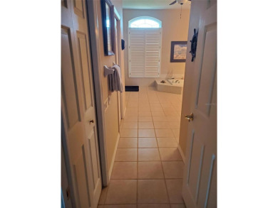 Selling our Florida home... 2,865 sq ft 4 bed / 3 bath / 3 car on Imperial Lakes Country Club in Florida - for sale on GolfHomes.com, golf home, golf lot