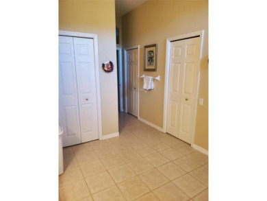 Selling our Florida home... 2,865 sq ft 4 bed / 3 bath / 3 car on Imperial Lakes Country Club in Florida - for sale on GolfHomes.com, golf home, golf lot