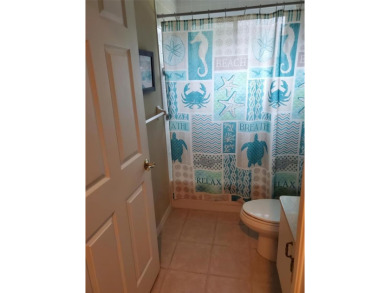 Selling our Florida home... 2,865 sq ft 4 bed / 3 bath / 3 car on Imperial Lakes Country Club in Florida - for sale on GolfHomes.com, golf home, golf lot