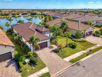 Some homes project confidence the moment you pull up. This one on Boca Royale Golf and Country Club in Florida - for sale on GolfHomes.com, golf home, golf lot