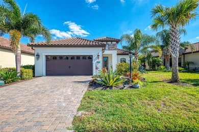 Some homes project confidence the moment you pull up. This one on Boca Royale Golf and Country Club in Florida - for sale on GolfHomes.com, golf home, golf lot