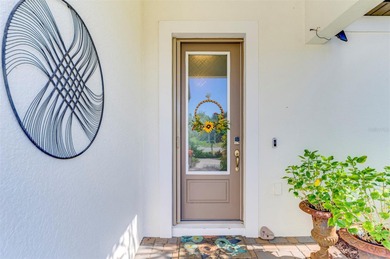 Some homes project confidence the moment you pull up. This one on Boca Royale Golf and Country Club in Florida - for sale on GolfHomes.com, golf home, golf lot