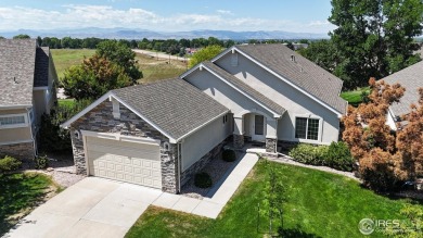 Prepare to be captivated by the allure of this stunning patio on Highland Meadows Golf Course in Colorado - for sale on GolfHomes.com, golf home, golf lot