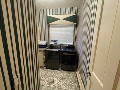 Owner financing is available.  This estate home sits on 1 acre on Black Diamond Ranch Golf Course in Florida - for sale on GolfHomes.com, golf home, golf lot